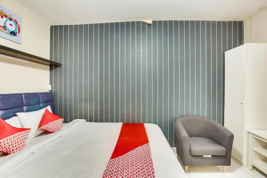 Bed in OYO 3247 Afira Rooms Aeropolis