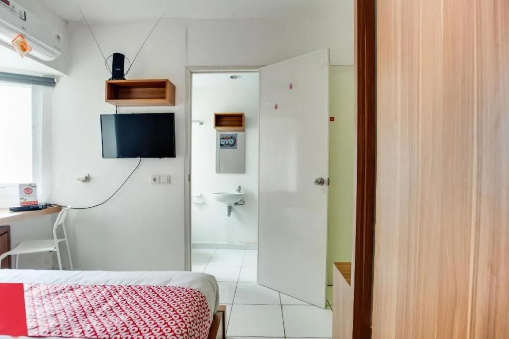 Bed in OYO 3247 Afira Rooms Aeropolis