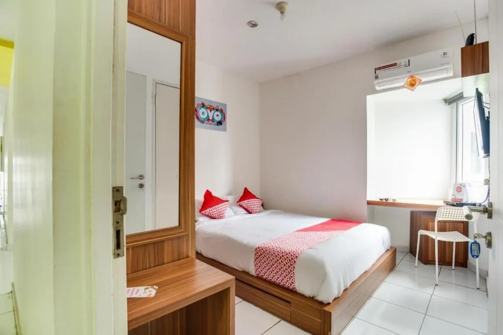 Bed in OYO 3247 Afira Rooms Aeropolis