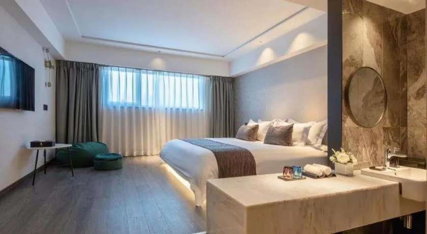 Bed in Taiyi International Hotel