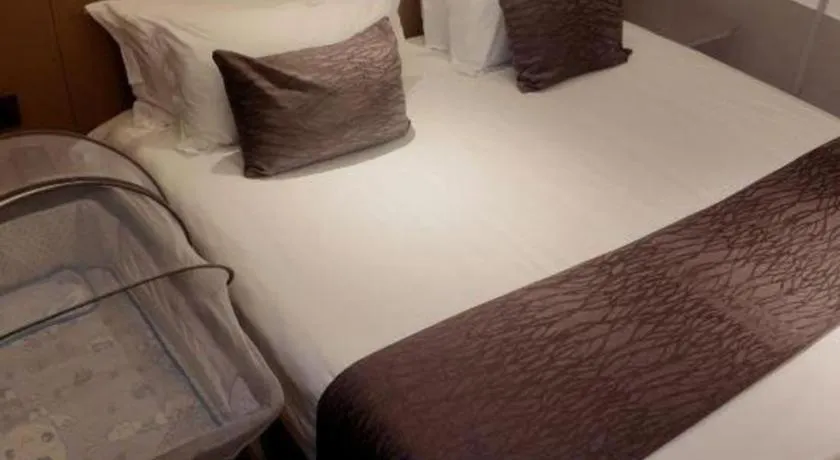 Bed in Taiyi International Hotel