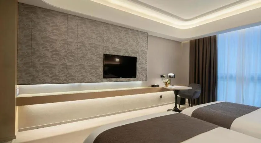 Bed in Taiyi International Hotel