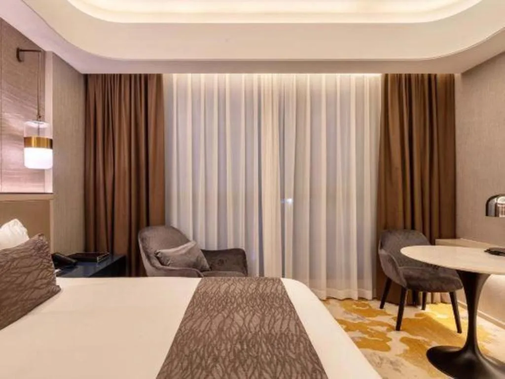 Bed in Taiyi International Hotel