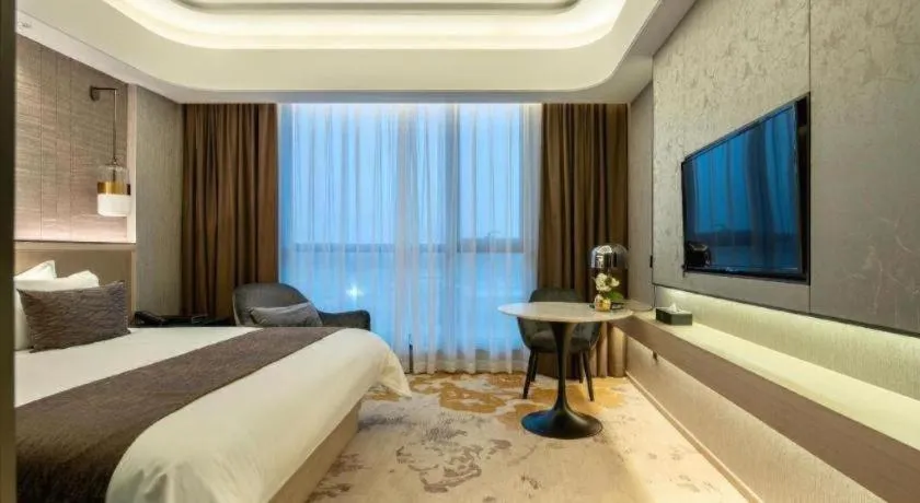 Bed in Taiyi International Hotel