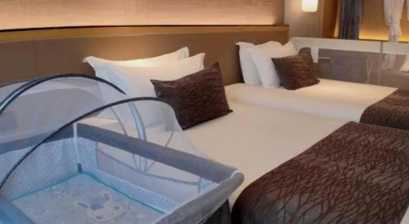 Bed in Taiyi International Hotel