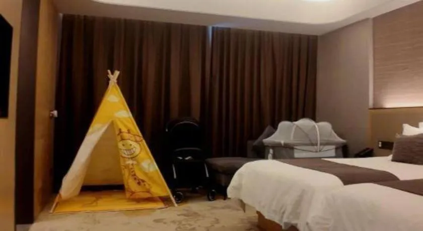 Bed in Taiyi International Hotel