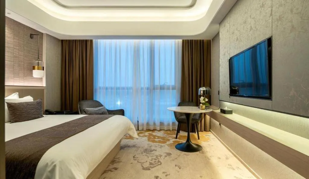 Bed in Taiyi International Hotel