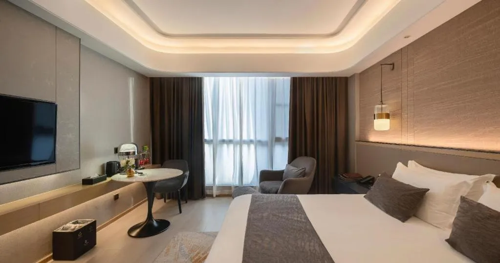 Bed in Taiyi International Hotel