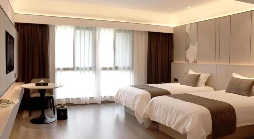 Bed in Taiyi International Hotel