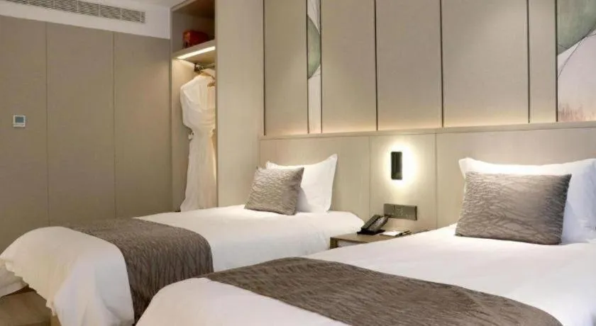 Bed in Taiyi International Hotel