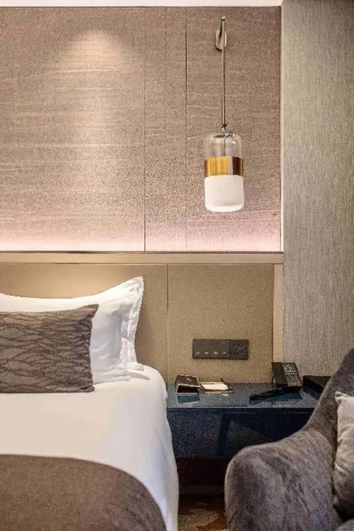 Bed in Taiyi International Hotel