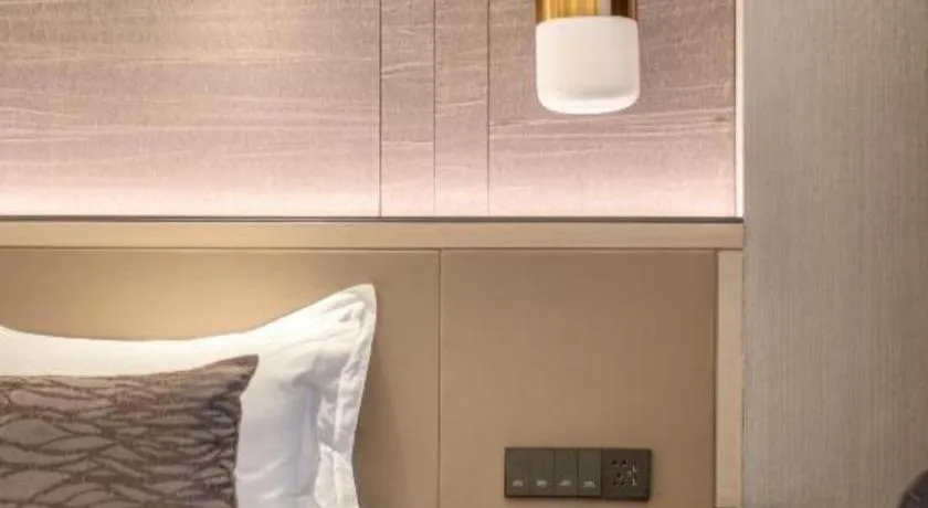 Bed in Taiyi International Hotel