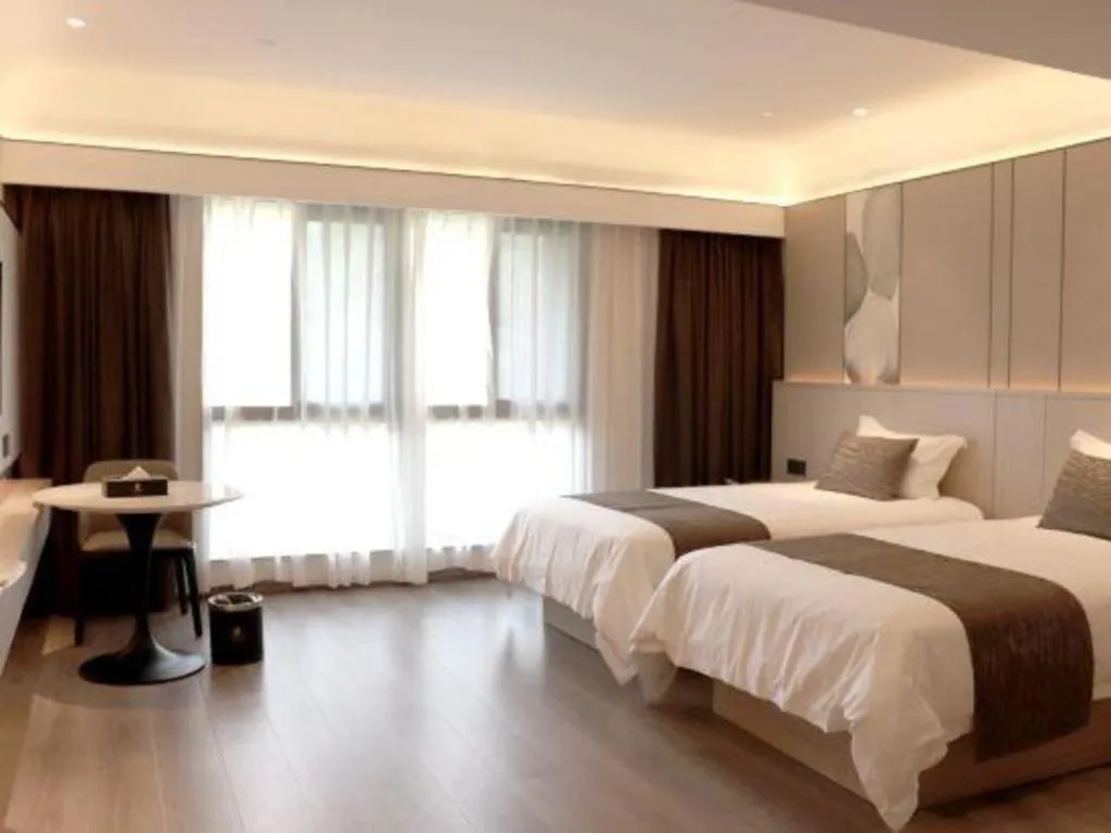 Bed in Taiyi International Hotel