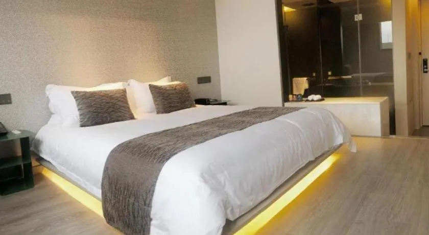 Bed in Taiyi International Hotel
