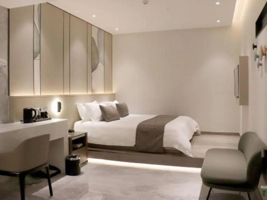 Bed in Taiyi International Hotel