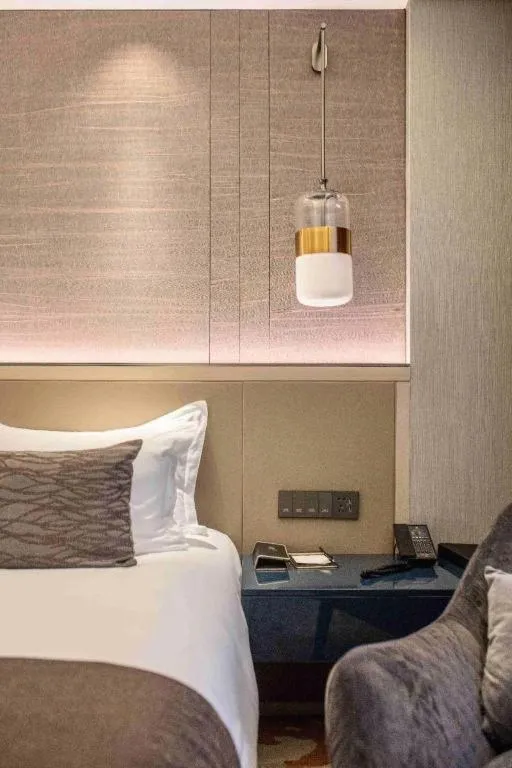 Bed in Taiyi International Hotel