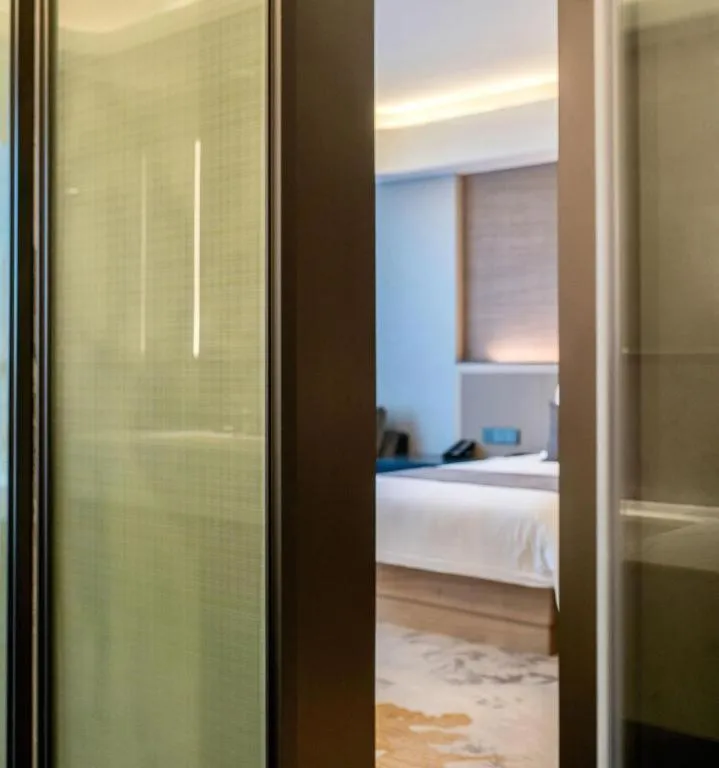 Bed in Taiyi International Hotel