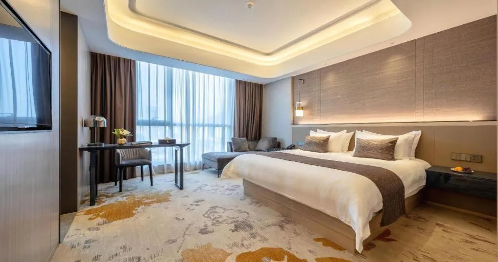 Bed in Taiyi International Hotel