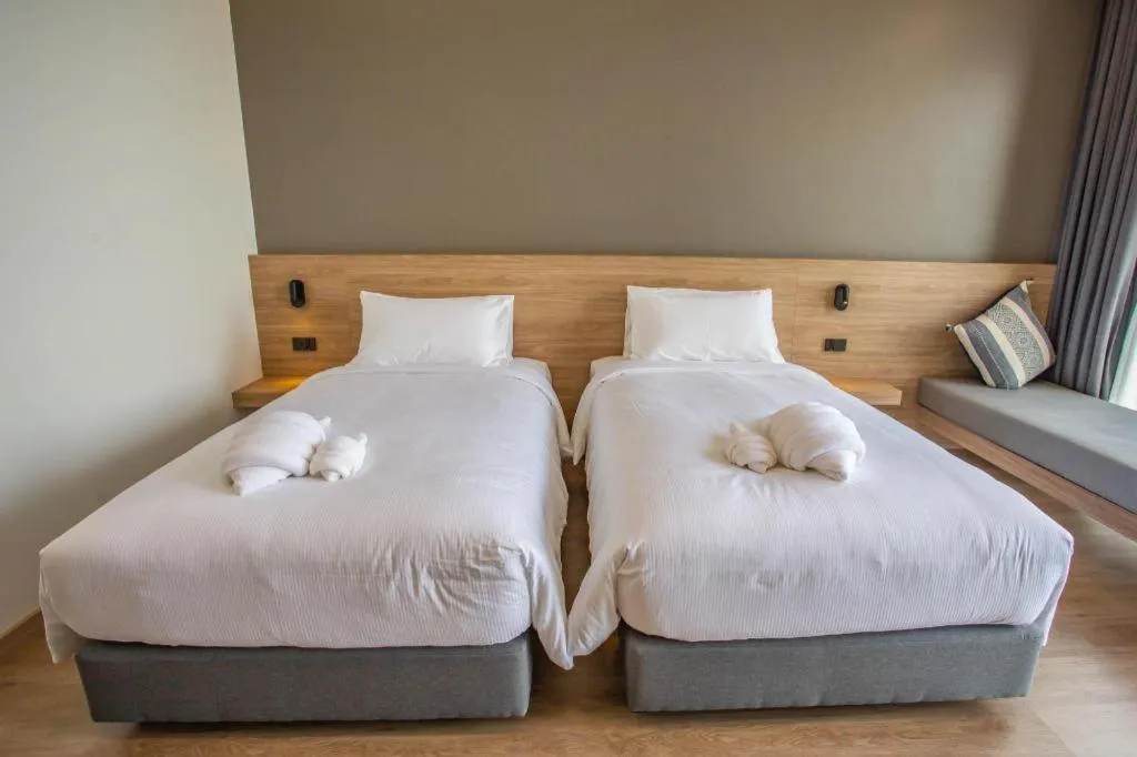 Bed in Chewa Khong Hotel Nakhon Phanom