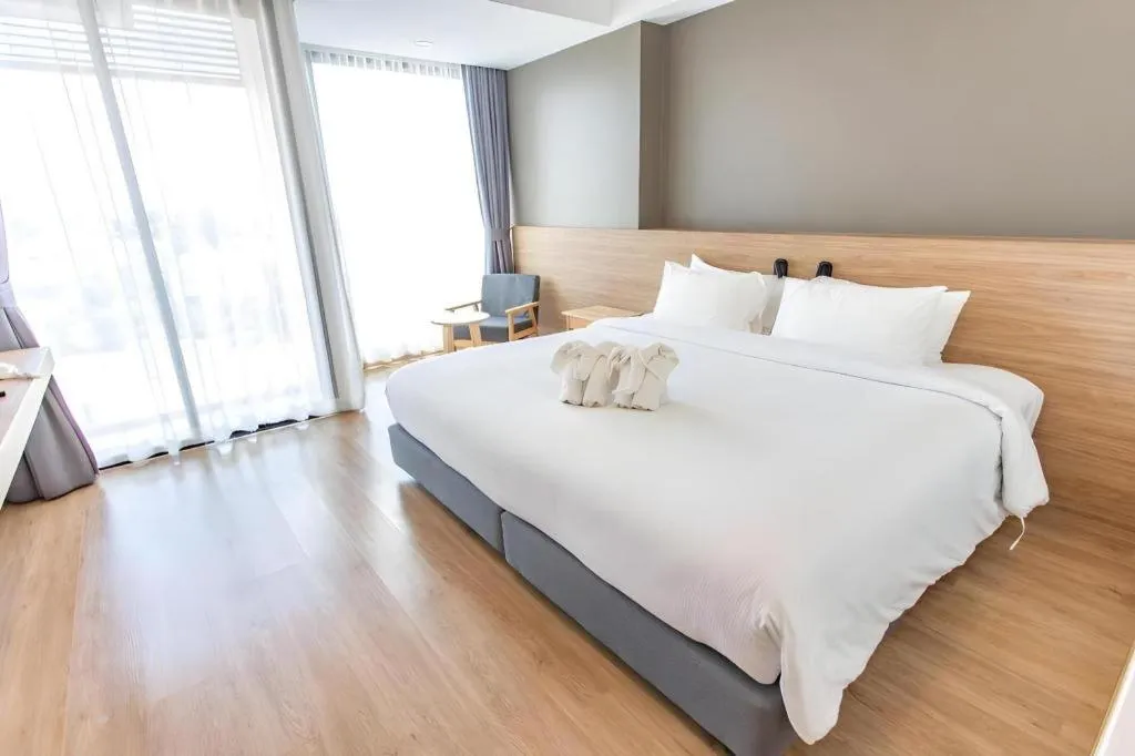 Bed in Chewa Khong Hotel Nakhon Phanom