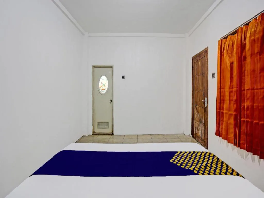 Bed in Hotel O Griya Sandi Residence Family NearPantai Boom