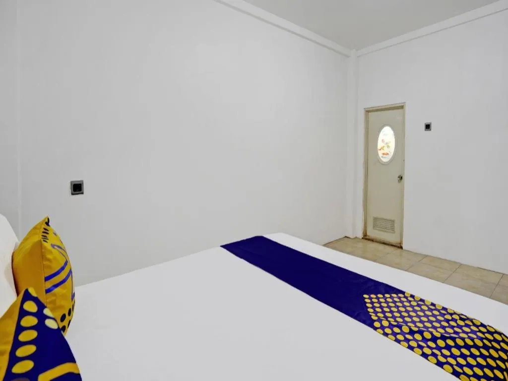 Bed in Hotel O Griya Sandi Residence Family NearPantai Boom