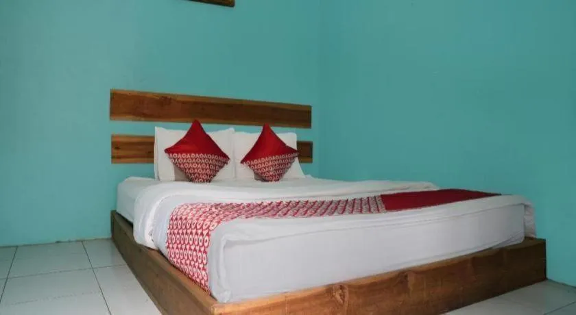 Bed in Hotel O Penginapan Raja