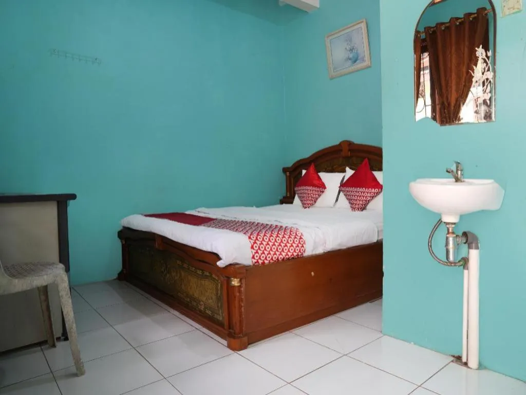 Bed in Hotel O Penginapan Raja