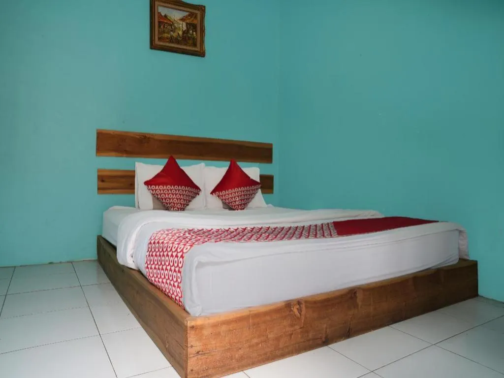 Bed in Hotel O Penginapan Raja