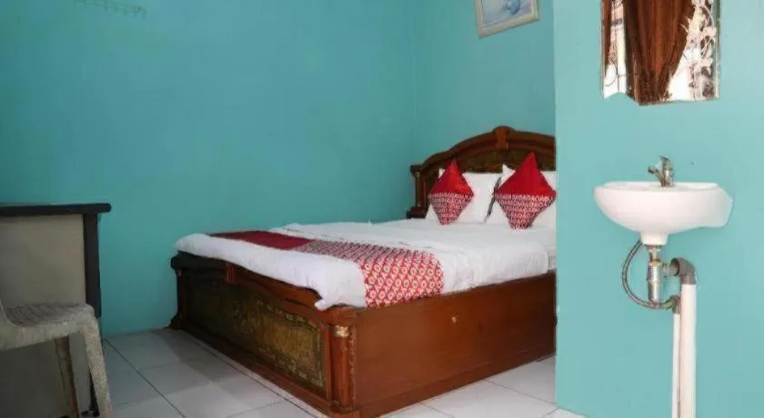 Bed in Hotel O Penginapan Raja