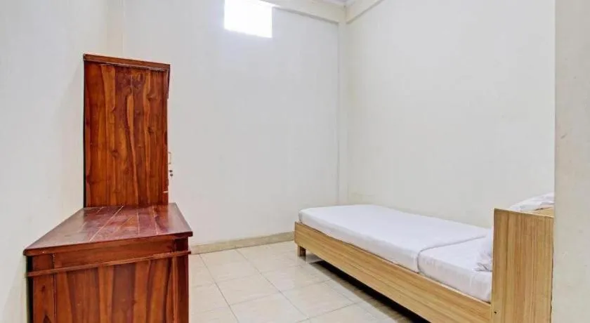 Bed in OYO Life 92663 Karmel 6