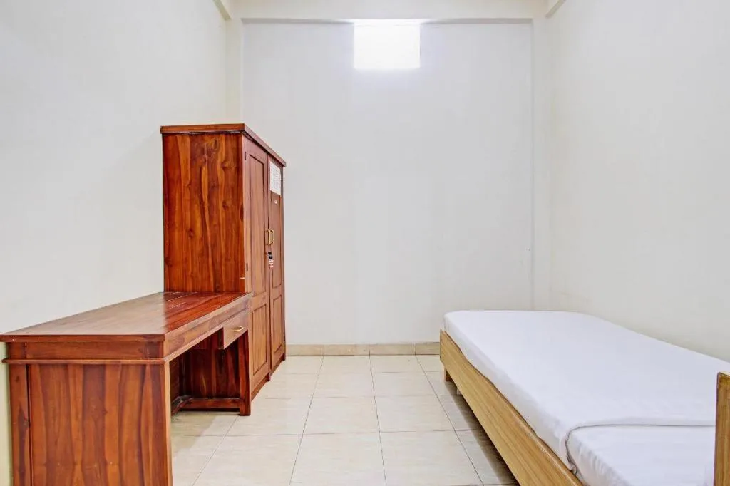 Bed in OYO Life 92663 Karmel 6