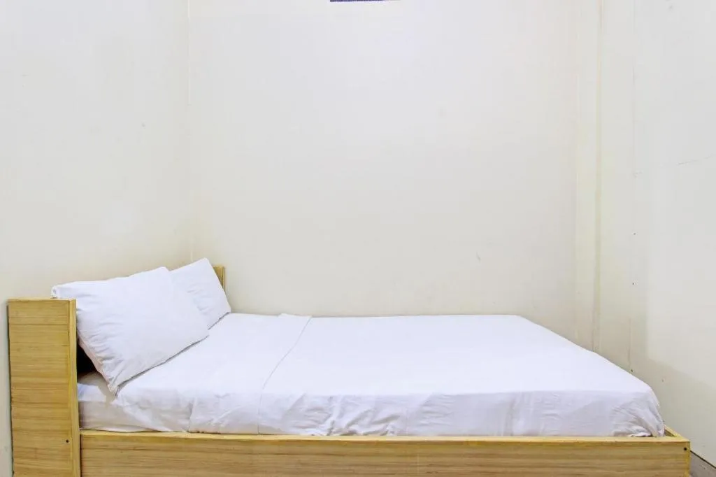 Bed in OYO Life 92663 Karmel 6