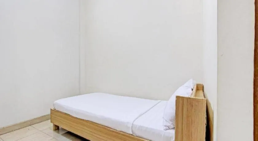 Bed in OYO Life 92663 Karmel 6