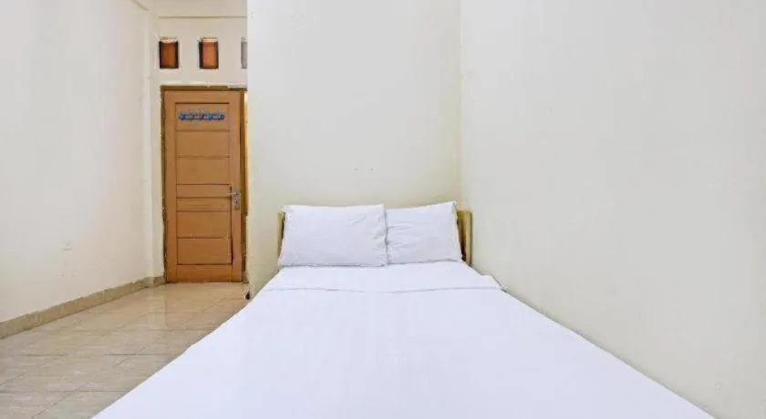 Bed in OYO Life 92663 Karmel 6