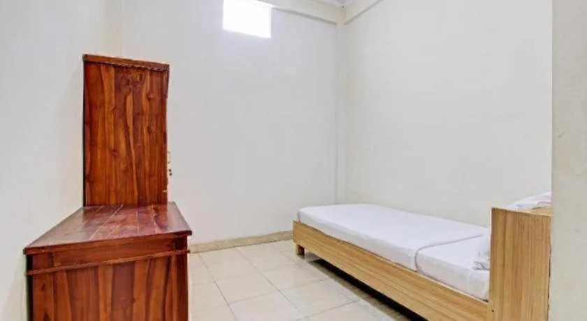 Bed in OYO Life 92663 Karmel 6