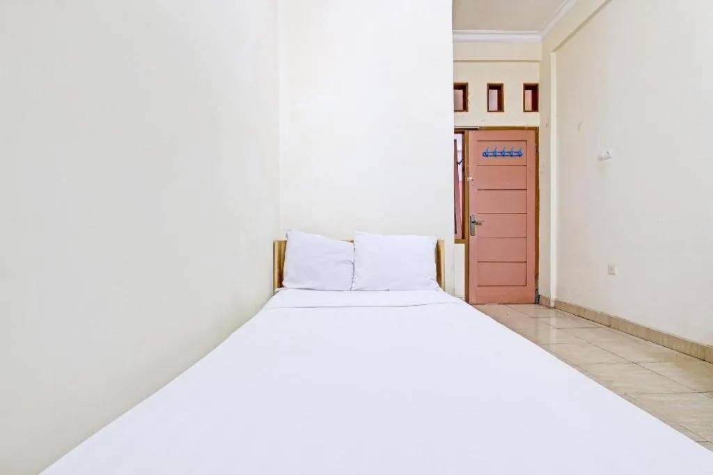 Bed in OYO Life 92663 Karmel 6