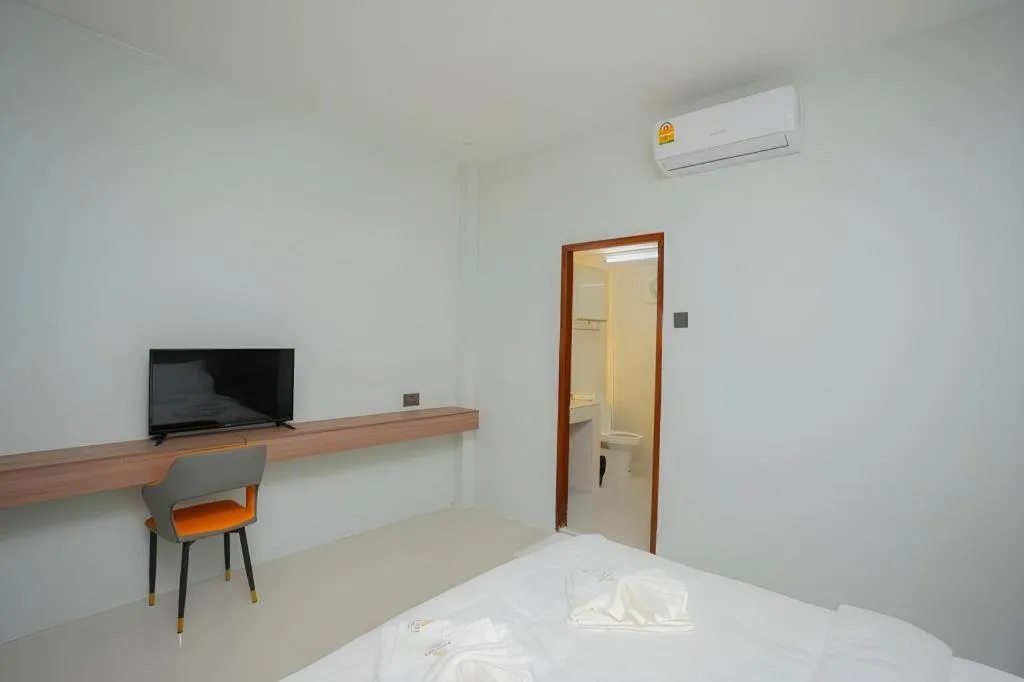 Bed in Athenee Hotel Vientiane