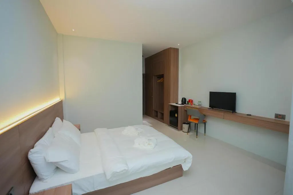 Bed in Athenee Hotel Vientiane