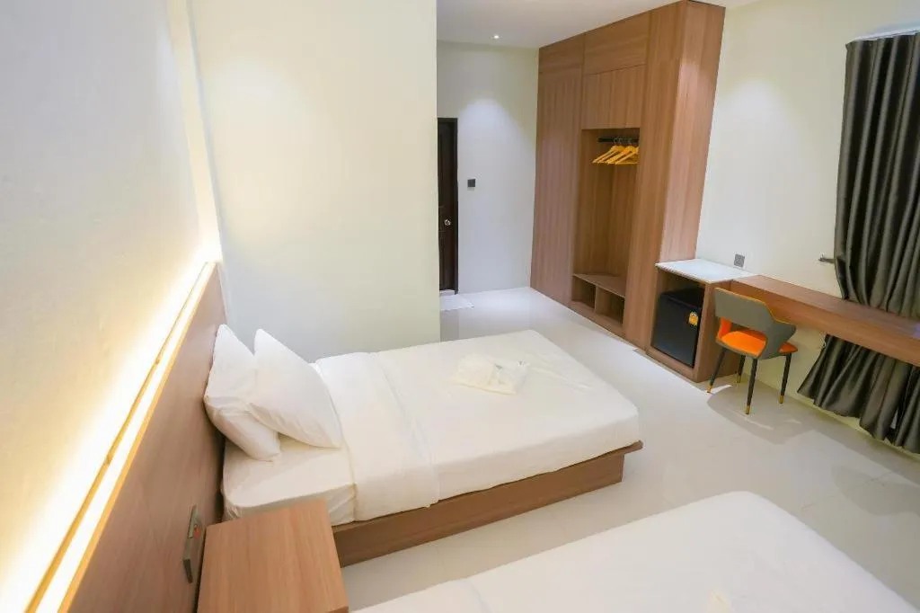 Bed in Athenee Hotel Vientiane