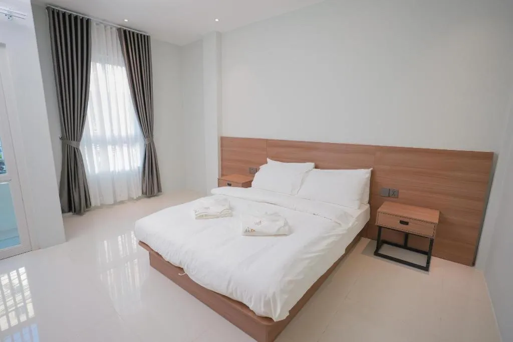 Bed in Athenee Hotel Vientiane