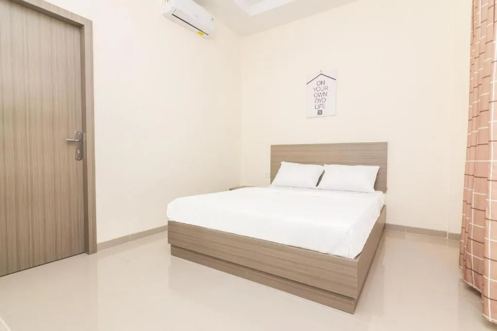 Bed in OYO Life 2735 Graha Nirwana