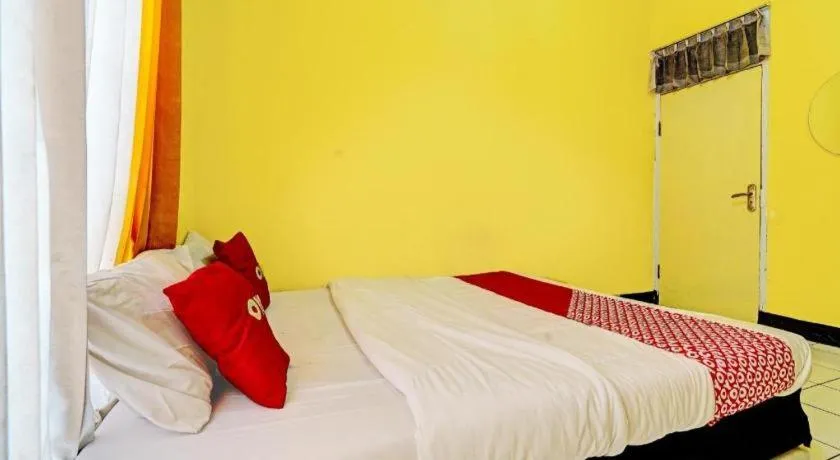 Bed in Hotel O P3 Guest House