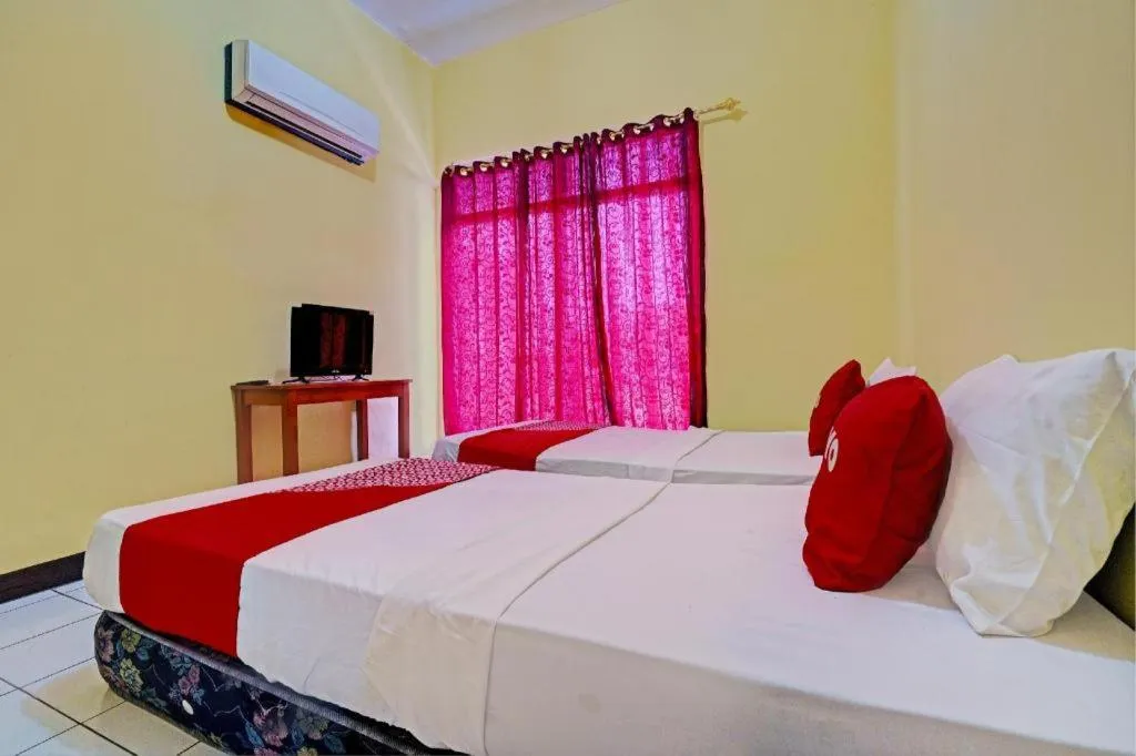 Bed in Hotel O P3 Guest House