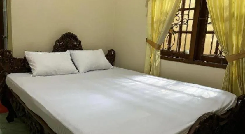 Bed in OYO 94003 Anjuk Ladang Homestay