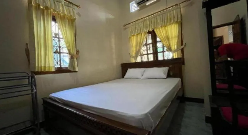 Bed in OYO 94003 Anjuk Ladang Homestay