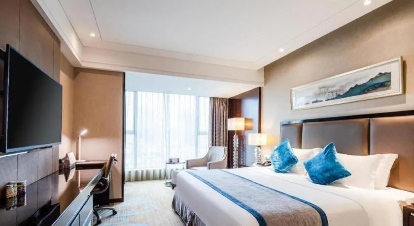 Bed in Chengdu Rising Butterfly Hotel