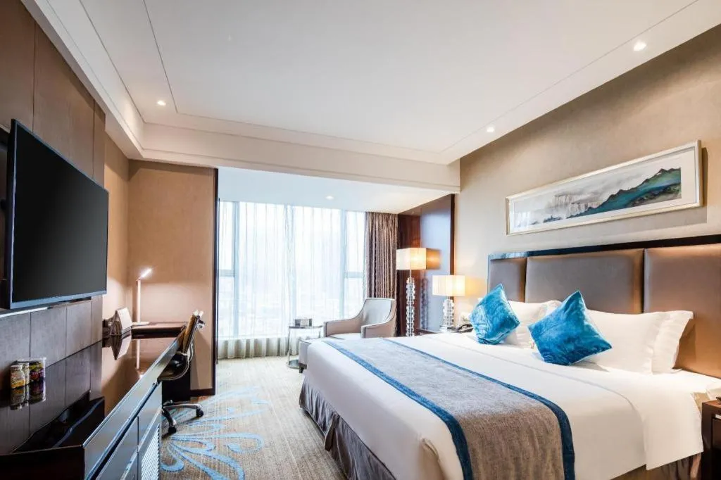 Bed in Chengdu Rising Butterfly Hotel