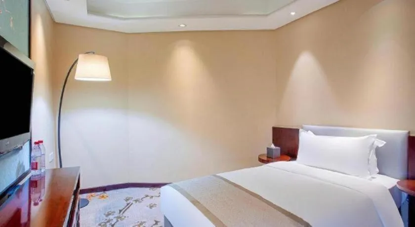 Bed in Meiyuan Hotel Hangzhou