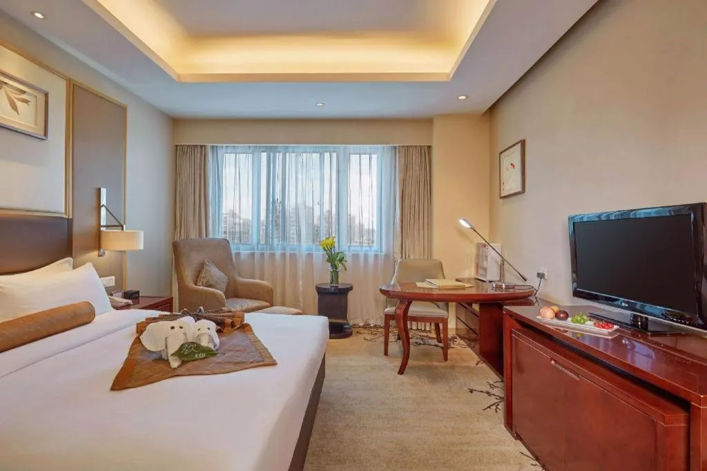 Bed in Meiyuan Hotel Hangzhou